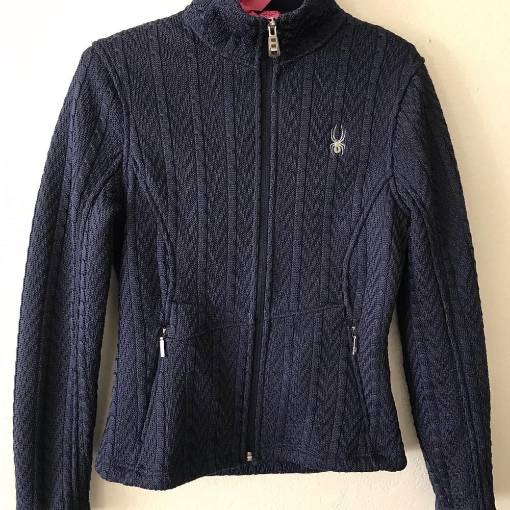 Spyder fleece zip-up jacket with cable sweater pattern. Size small. Navy blue